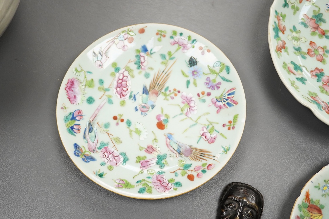 A Japanese bronze mask and four famille rose dishes - largest 29cm